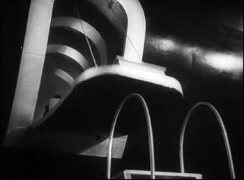 『来るべき世界』 1936、約56分：飛行機の搭乗口