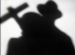『キャット・ピープル』 1942　約1時間5分：夜の事務室＋十字架状の影