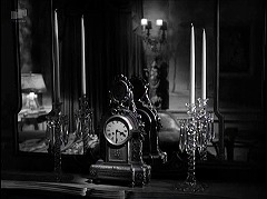 『扉の蔭の秘密』 1947　約1時間11分：寝室の鏡　燭台とその鏡像