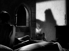 『奇妙な扉』 1952　約19分：デニスの部屋　壁に影　窓の下に階段（階段その3）