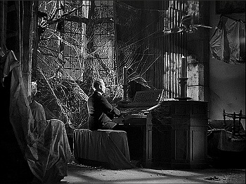 『古城の妖鬼』 1935、約32分：城、書斎、オルガン