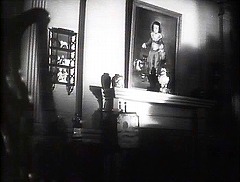 『キャット・ピープル』 1942　約1時間8分：アパートの居間　壁にゴヤの《マヌエル・オソーリオ・デ・スニガ》